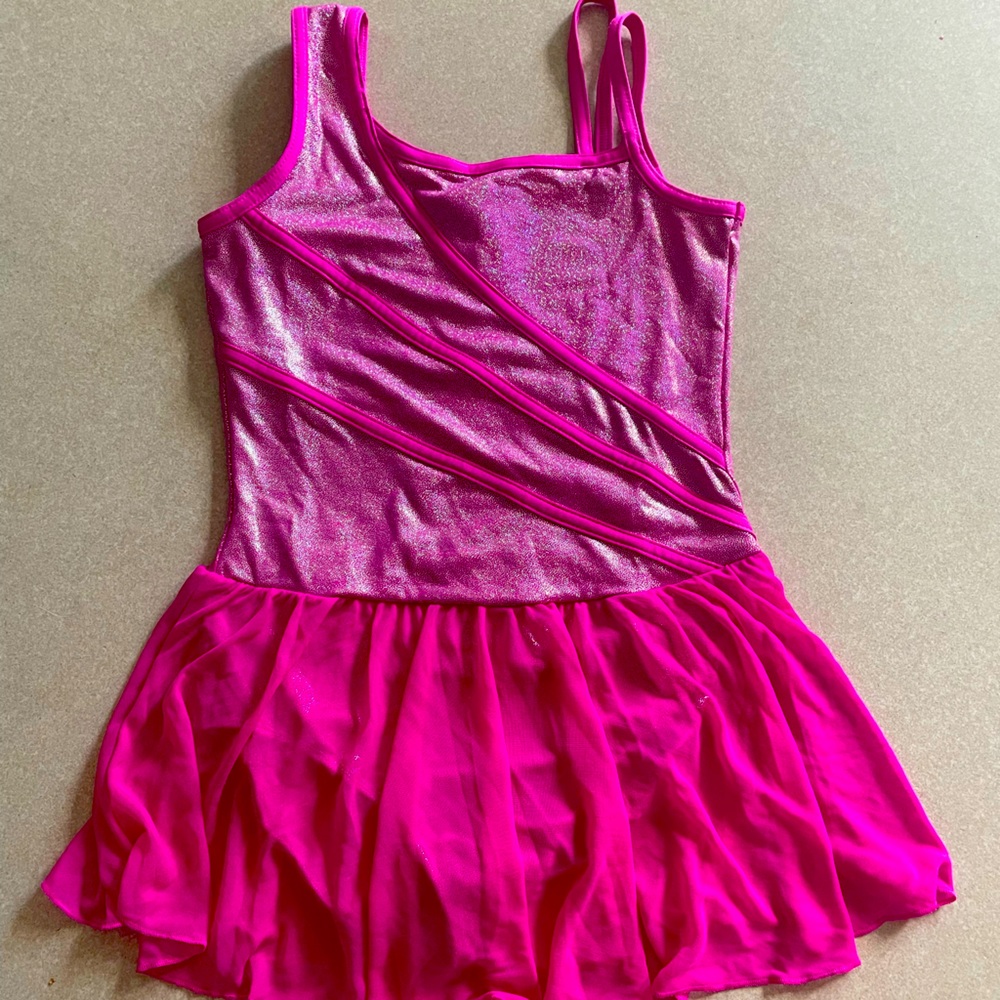 Capezio girls gymnastics leotards pink and multi colored with attaching skirt.